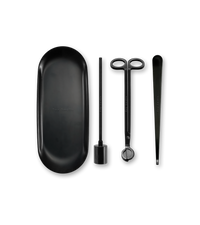 Product shot of 5 matte black tools against a neutral background all with a subtle boy smells logo on the tools.