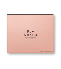 Product shot of the pink box with black text and the Boy Smells logo against a neutral background.